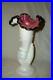 Fenton-Hand-Holding-Vase-Iridescent-Milk-Glass-Pink-Ruffle-Black-Crest-Marked-01-pntl
